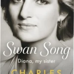Charles Spencer holding Swan Song hardcover biography of Princess Diana